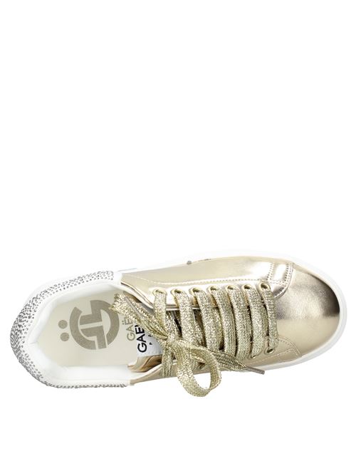 Leather and rhinestone sneakers. GAELLE | VD2011ORO